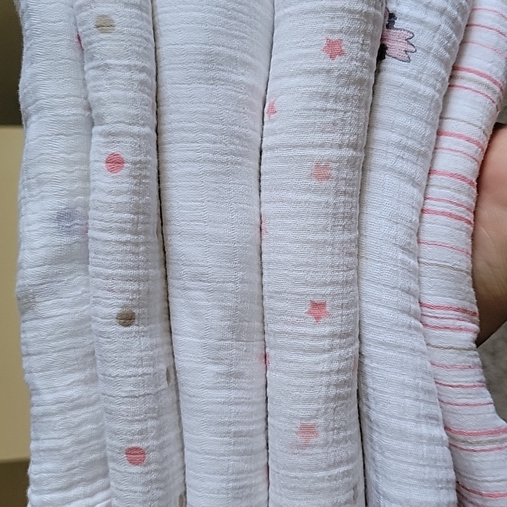 Aden by Aden+Anais muslin swaddling blankets.